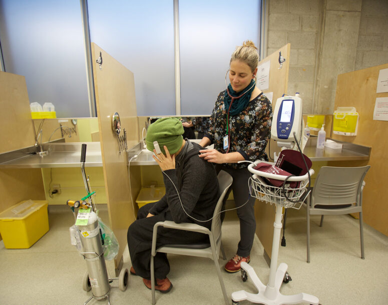 A service provider assisting at a safe injection site