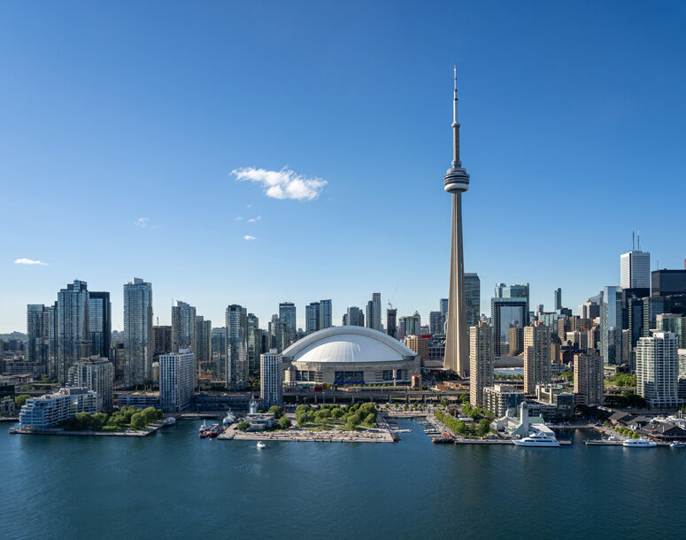 The waterfront of the city of Toronto on a clear day.