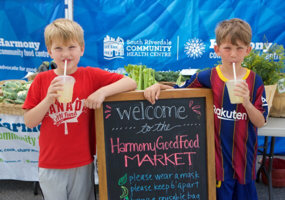 two children at the food market